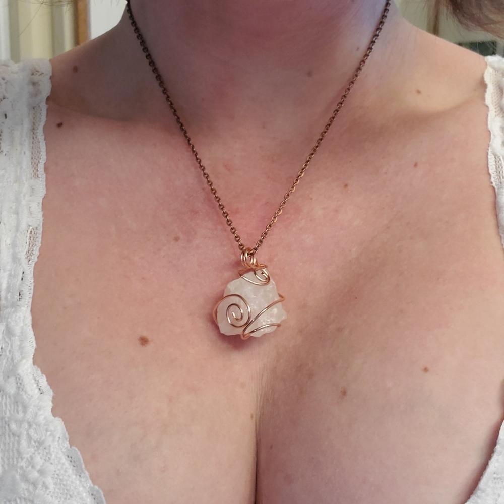 Rose quartz wire wrapped necklace.